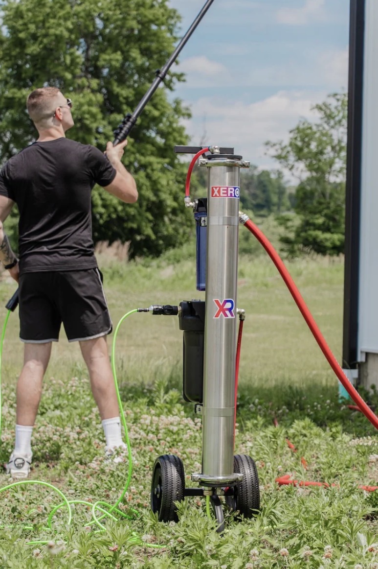 SB Window Cleaning water-fed pole system filtering pure water in Valdosta, GA